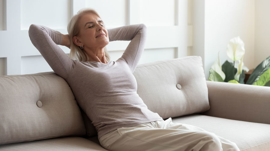 Woman relaxing on couch